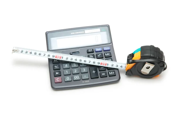 Calculator and tape measure isolated on white — Stock Photo, Image