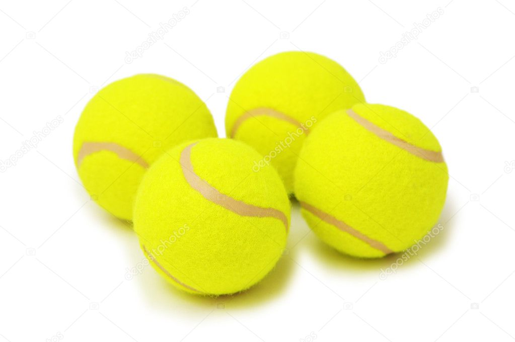 Four tennis balls isolated on the white