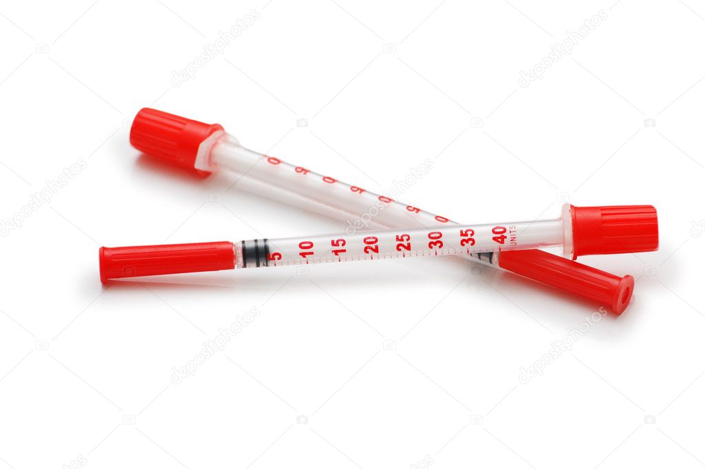 Two syringes isolated on the white background