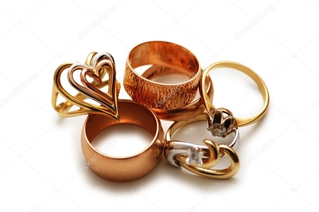 Various golden rings isolated on white background