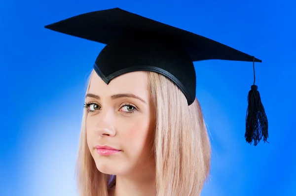 Boldog diplomás színes háttérrel — Stock Fotó