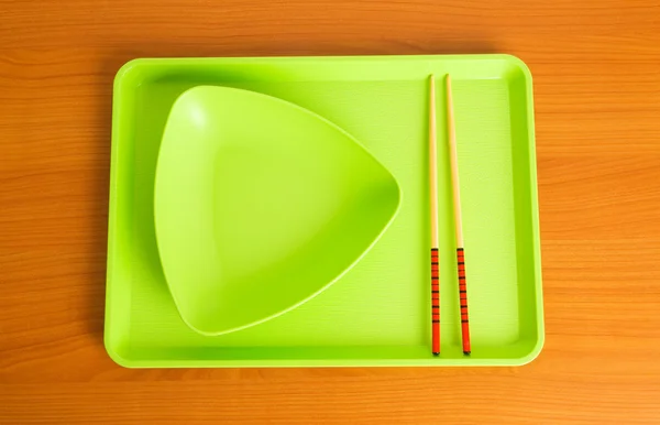Plaka ve yemek çubukları ile Asya gıda kavramı — Stok fotoğraf