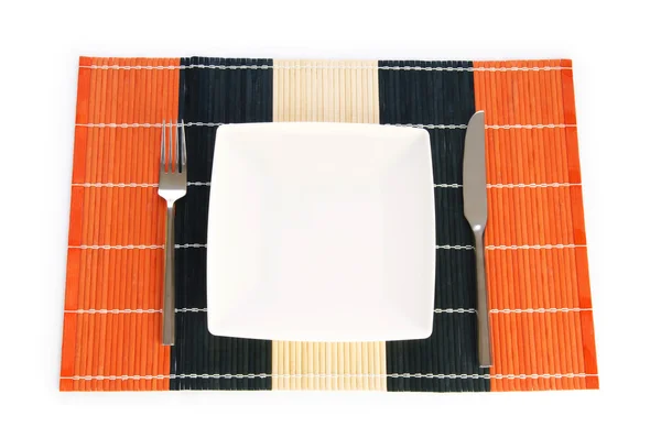 Deska s nádobím izolovaných na bílém — Stock fotografie