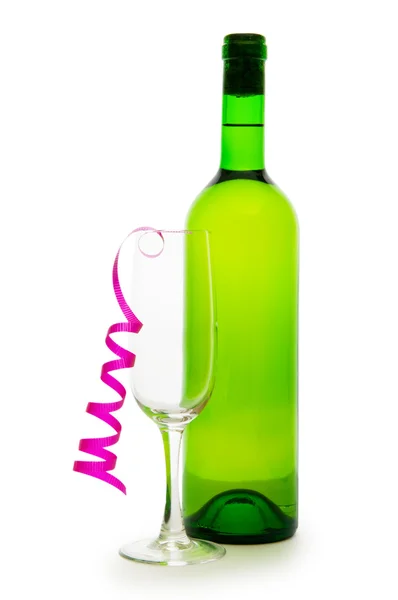Bottle of wine and glass with streamer on white — Stock Photo, Image