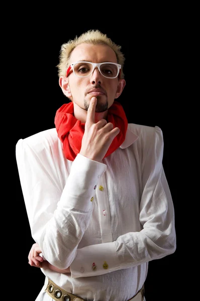 Man with red scarf on the black — Stock Photo, Image