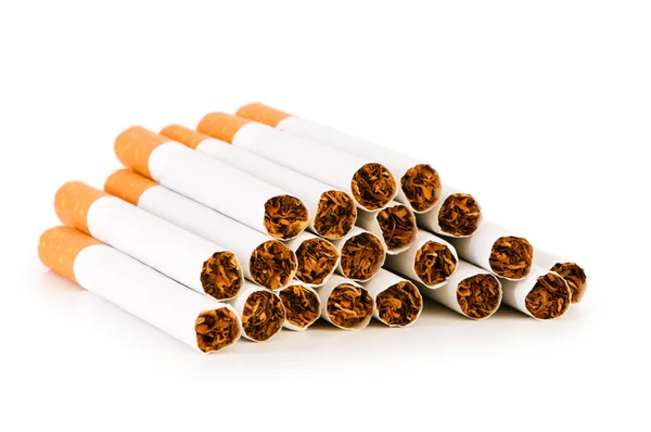 Fumer des cigarettes isolées sur le fond blanc Photo De Stock