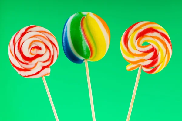Colourful lollipop against the colourful background Stock Image