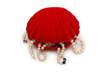 Red peal-shaped box with pearl beads isolated on white clipart