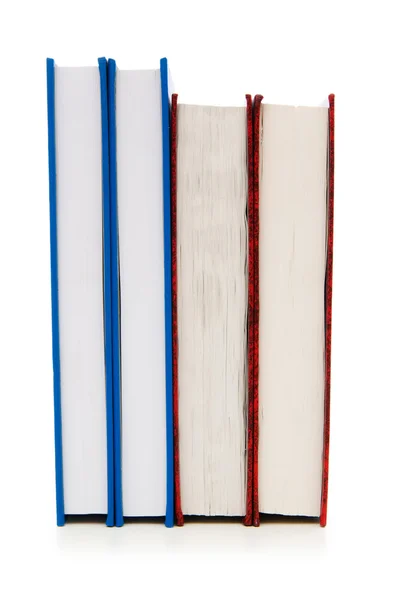 Стопка книг, изолированных на белом фоне — стоковое фото