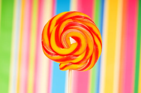 在色彩缤纷的背景色彩缤纷棒棒糖 — 图库照片