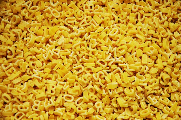 Alphabet pasta - can be used as a background — Stock Photo, Image