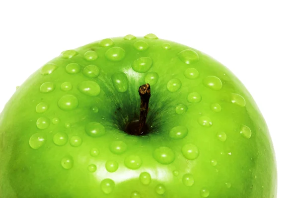 Närbild av ett äpple med vatten droppar — Stockfoto