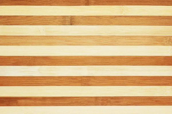 stock image Texture of striped wooden board to serve as background