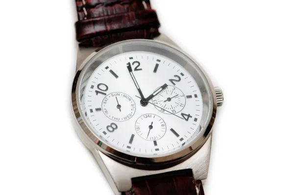 Close-up van hand horloge geïsoleerd op wit — Stockfoto