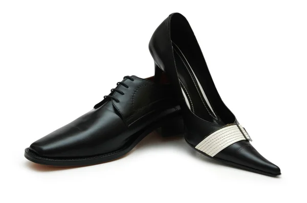 Svarta manliga och kvinnliga skor isolerad på vit — Stockfoto