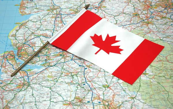 Bandeira do Canadá sobre o mapa — Fotografia de Stock