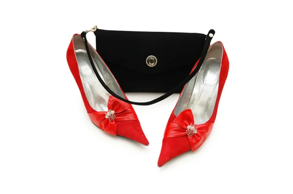 Röd kvinna skor och svart väska isolerad på vit — Stockfoto