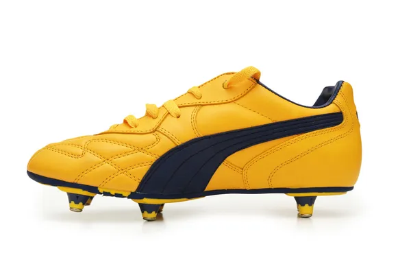 Botas de fútbol amarillas aisladas en el blanco - más pies en mi portafolio —  Fotos de Stock