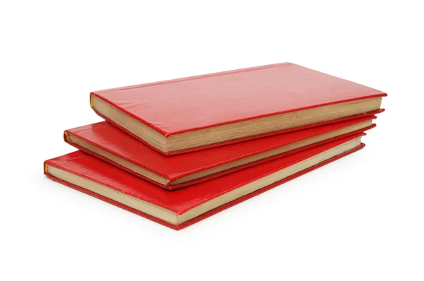 Tres libros rojos aislados sobre fondo blanco —  Fotos de Stock