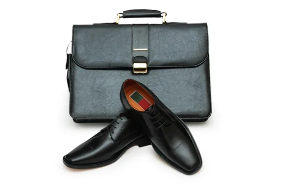 stock image Black briefcase and male shoes isolated on white - more footware in my por