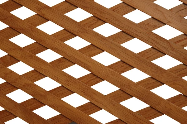 Wooden trellis with rhomb shaped holes — Stock Photo, Image