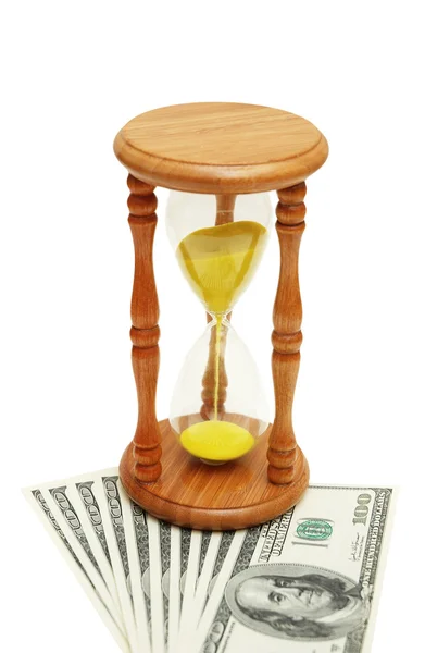 "El tiempo es dinero "concepto - reloj de arena y dólares — Foto de Stock