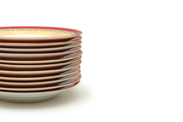 Stacked plates isolated on white - space for your text — Stock Photo, Image