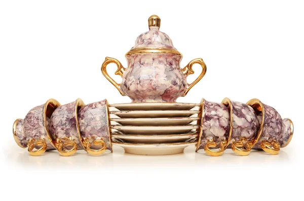 Tea set with six cups isolated on white — Stock Photo, Image