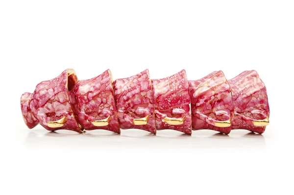 Tazze da tè rosa disposte in fila isolate su bianco — Foto Stock