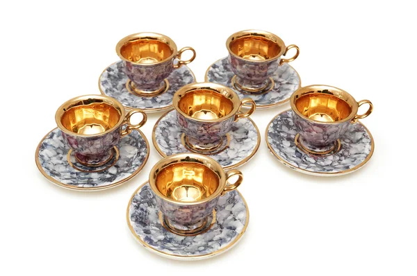 Six cups and saucers isolated on white — Stock Photo, Image