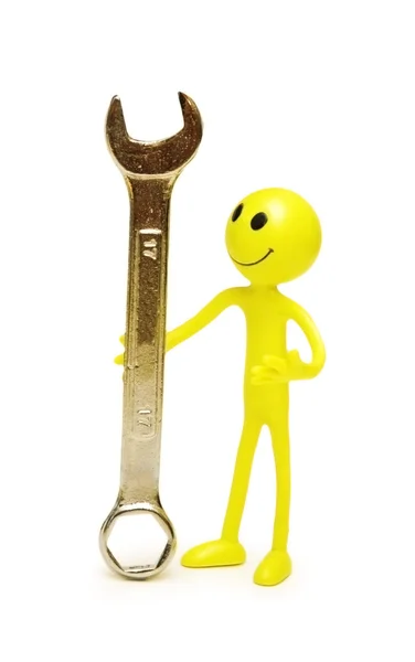 Smilie with spanner isolated on white — Stock Photo, Image