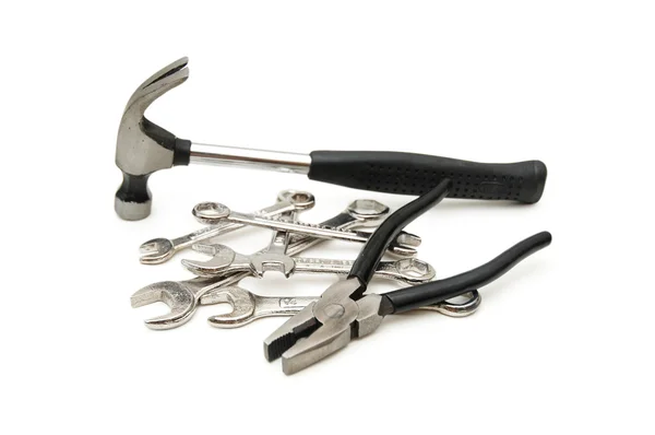 Varias herramientas - martillo, llaves, alicates - aislado en blanco — Foto de Stock