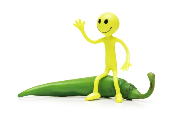 Smileys auf grünem Chilipfeffer — Stockfoto