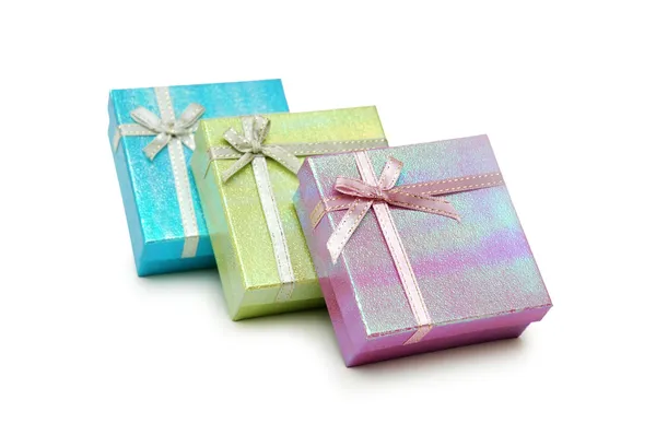 Tres cajas de regalo aisladas en blanco — Foto de Stock