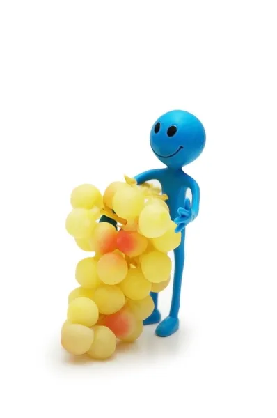 Figure of smiley with grapes isolated on white — Stock Photo, Image