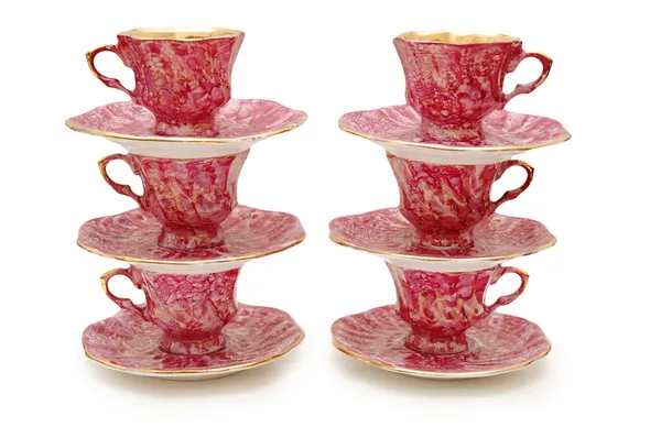 Six cups with saucers stacked on top of each other — Stock Photo, Image
