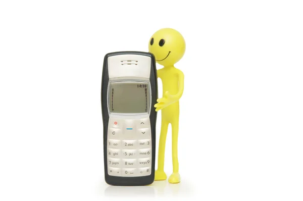 Figure de smiley avec téléphone portable isolé sur blanc — Photo