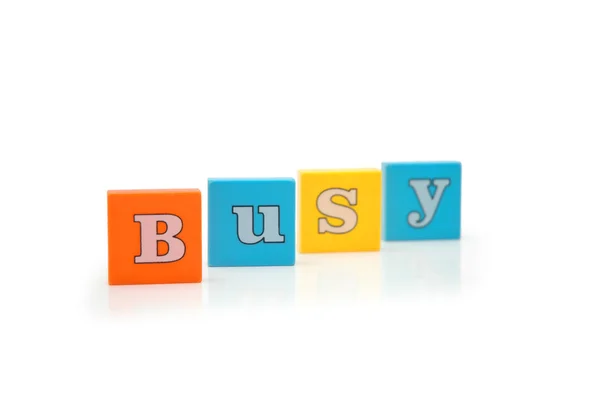 Ordet "upptagen" isolerad på vit — Stockfoto