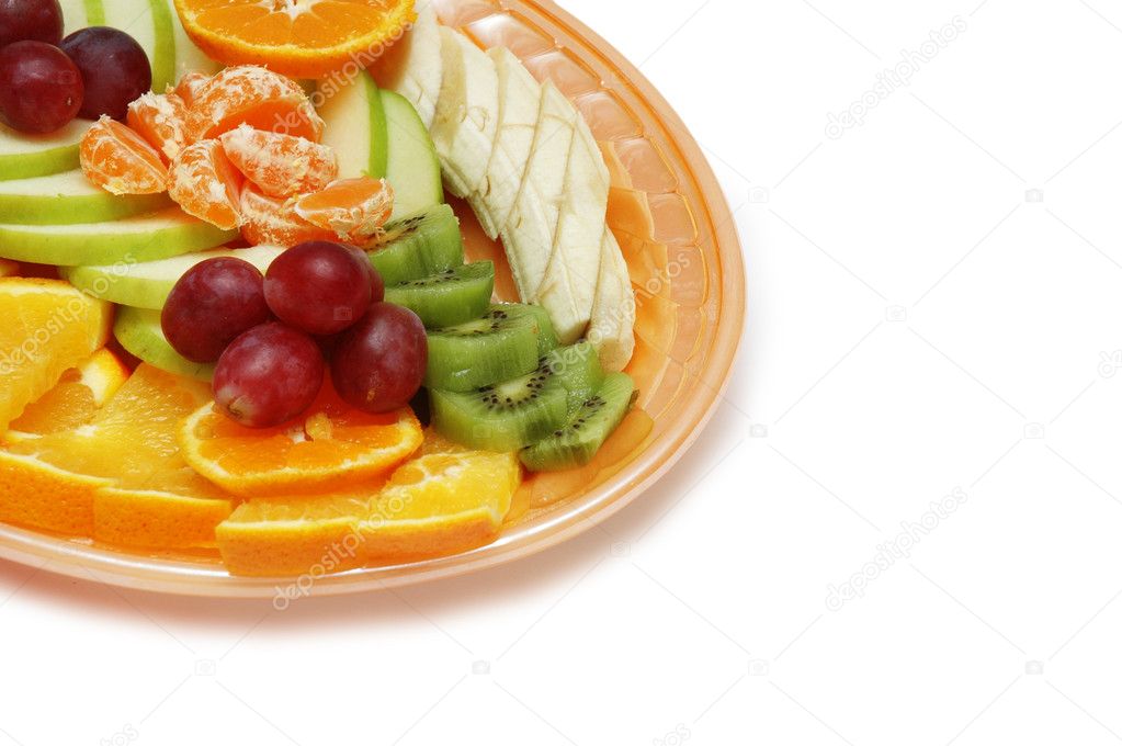 Plate with fruit salad isolated on white - space for your text