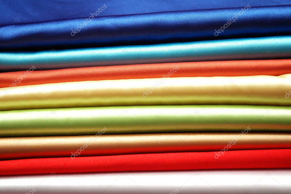 Stack of satin fabric of various colours