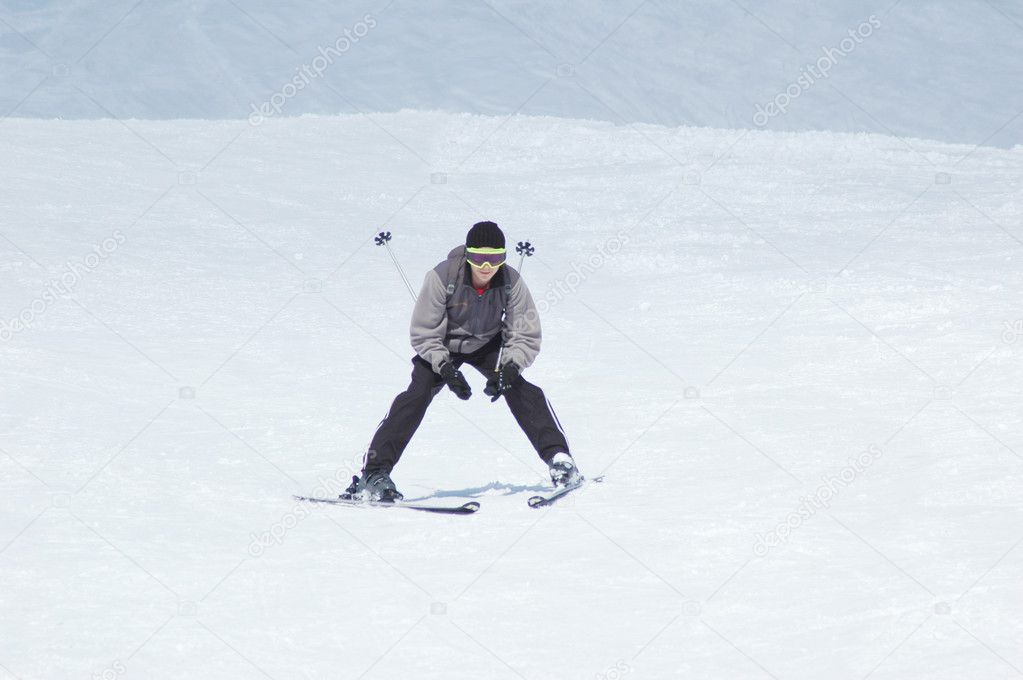 Skier skiing down the hill