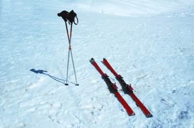 Skis and poles in the snow clipart