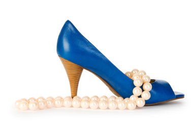 Woman shoes and necklace isolated on the white background clipart