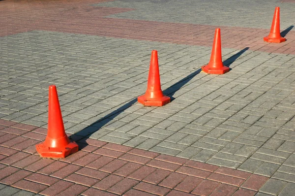 Red cones aligned in row — Stock Photo, Image