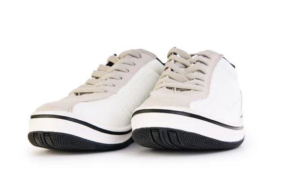 Sportiga skor isolerat på den vita bakgrunden — Stockfoto