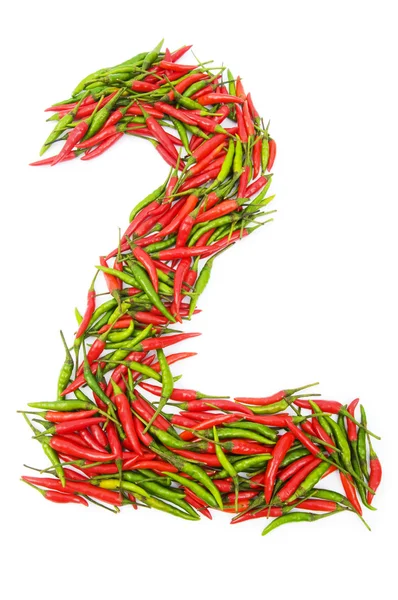 Numbers with green and red peppers — Stock Photo, Image