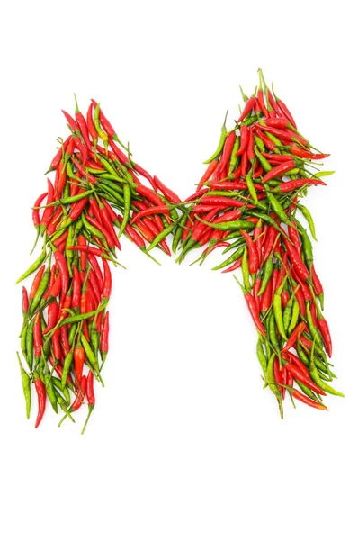 Alfabeto com pimentas verdes e vermelhas — Fotografia de Stock