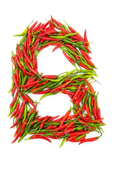 Alfabet met groene en rode paprika 's — Stockfoto