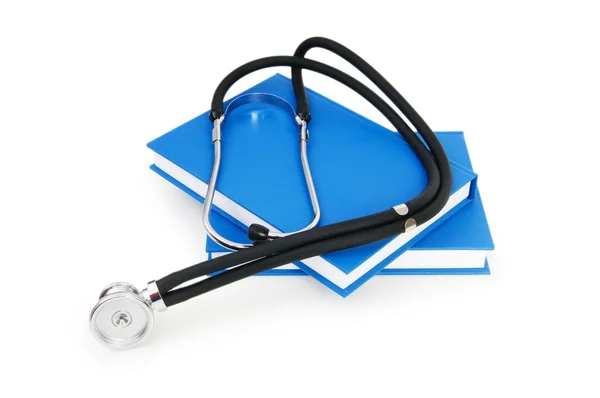 Begreppet medicinsk pedagogik med bok och stetoskop — Stockfoto