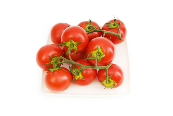 Tomates rojos aislados sobre el fondo blanco — Foto de Stock